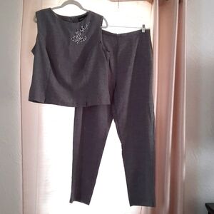 Gently worn 2 piece size 16 Danielle Casey sleeveless gray pinstriped pant suit.